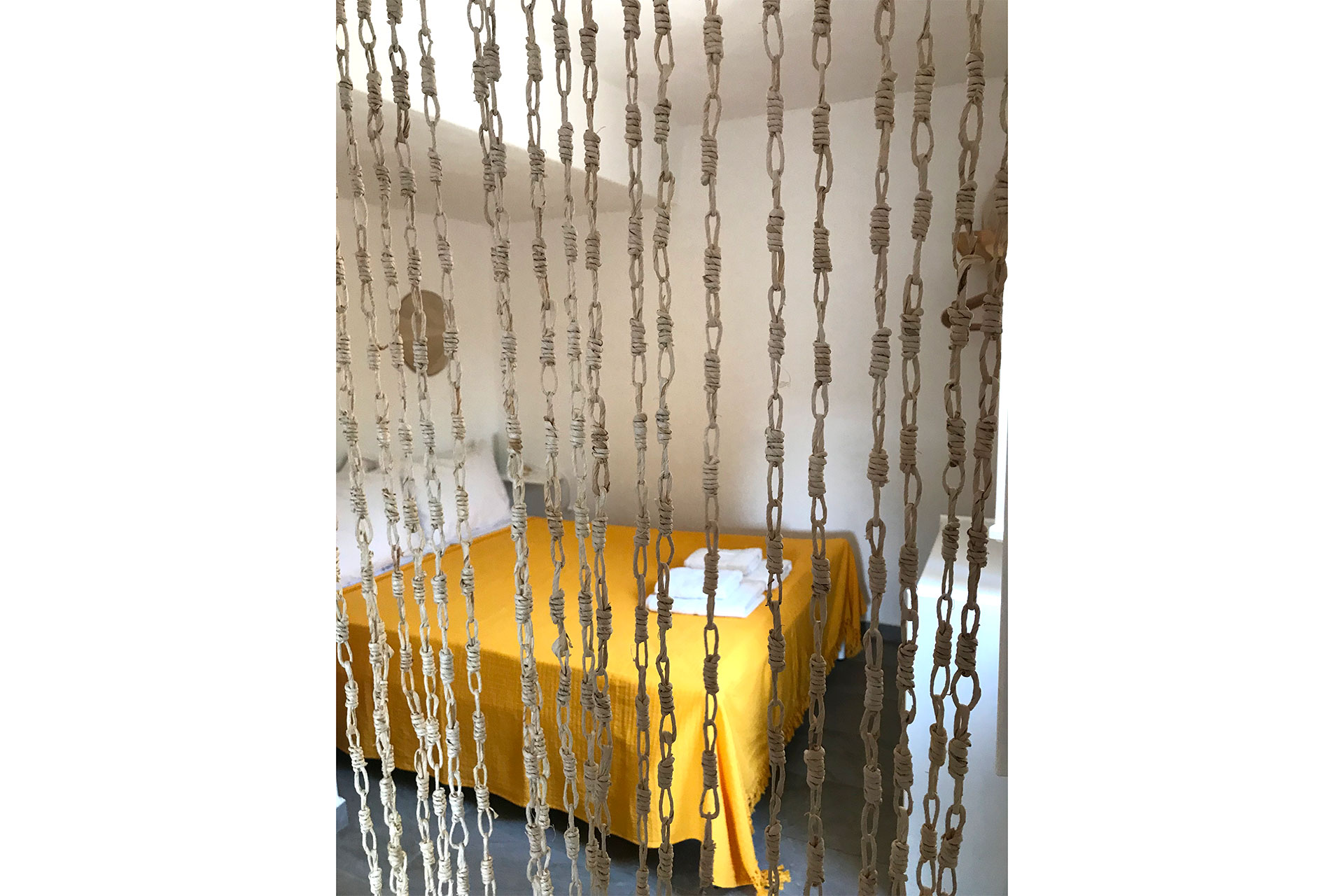 Bedroom with double bed at Elia family house at Sifnos